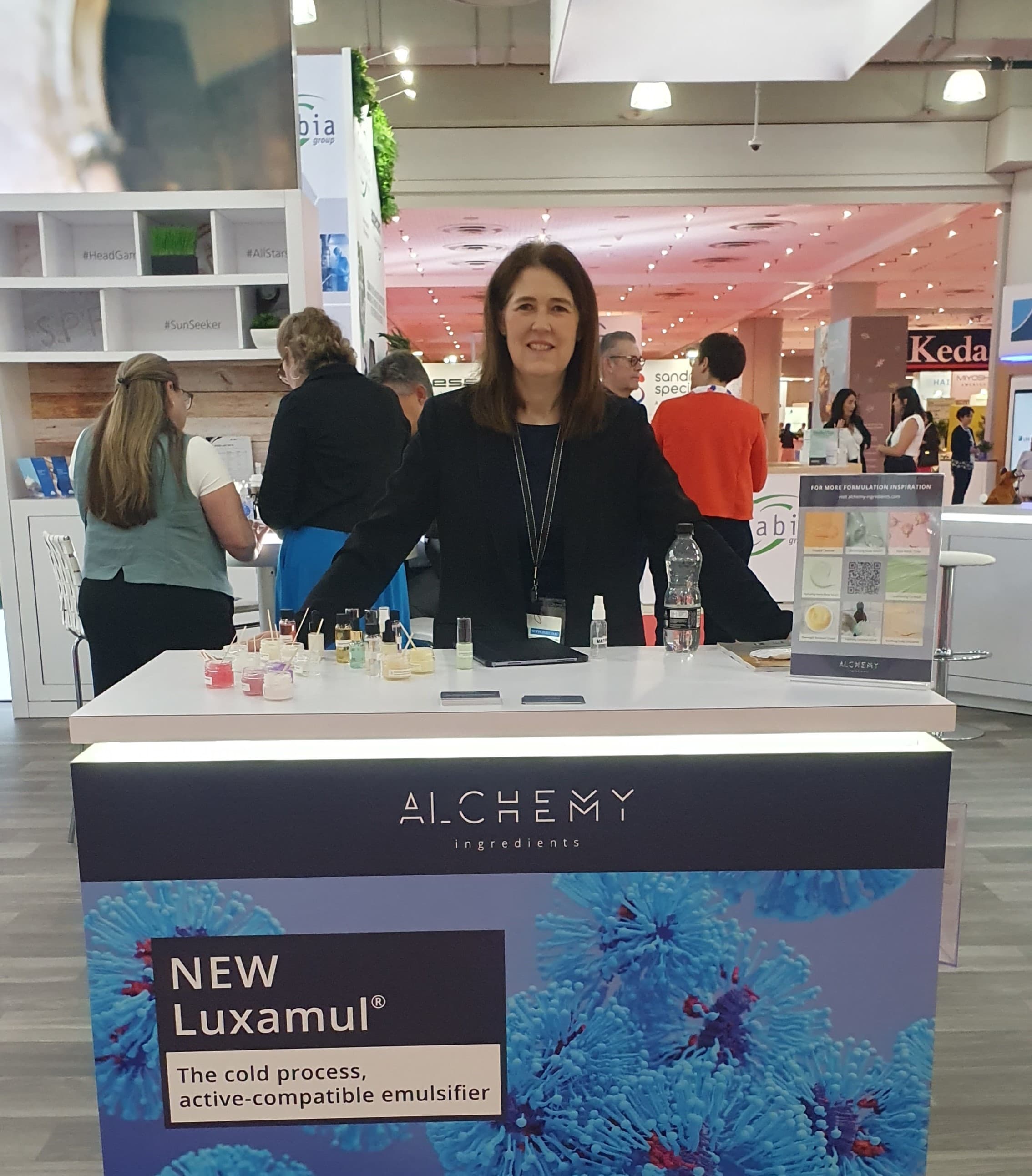 Caroline on a trade show stand