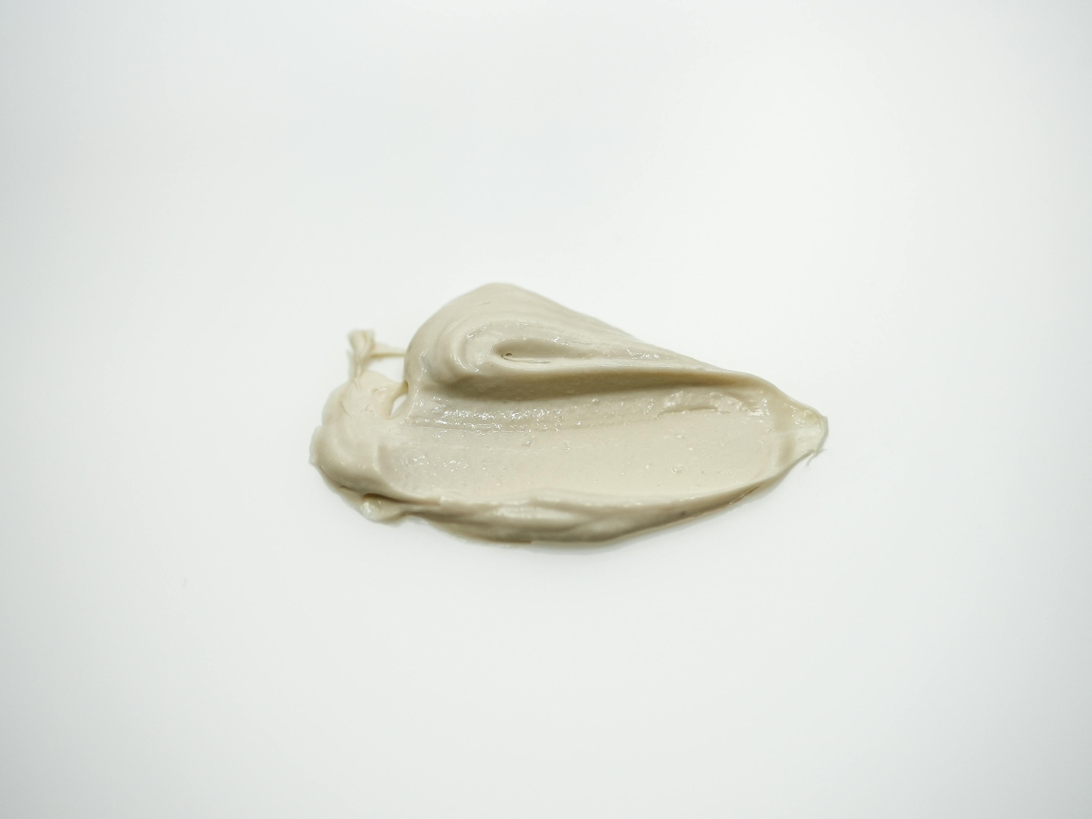 Off-white putty on a white background