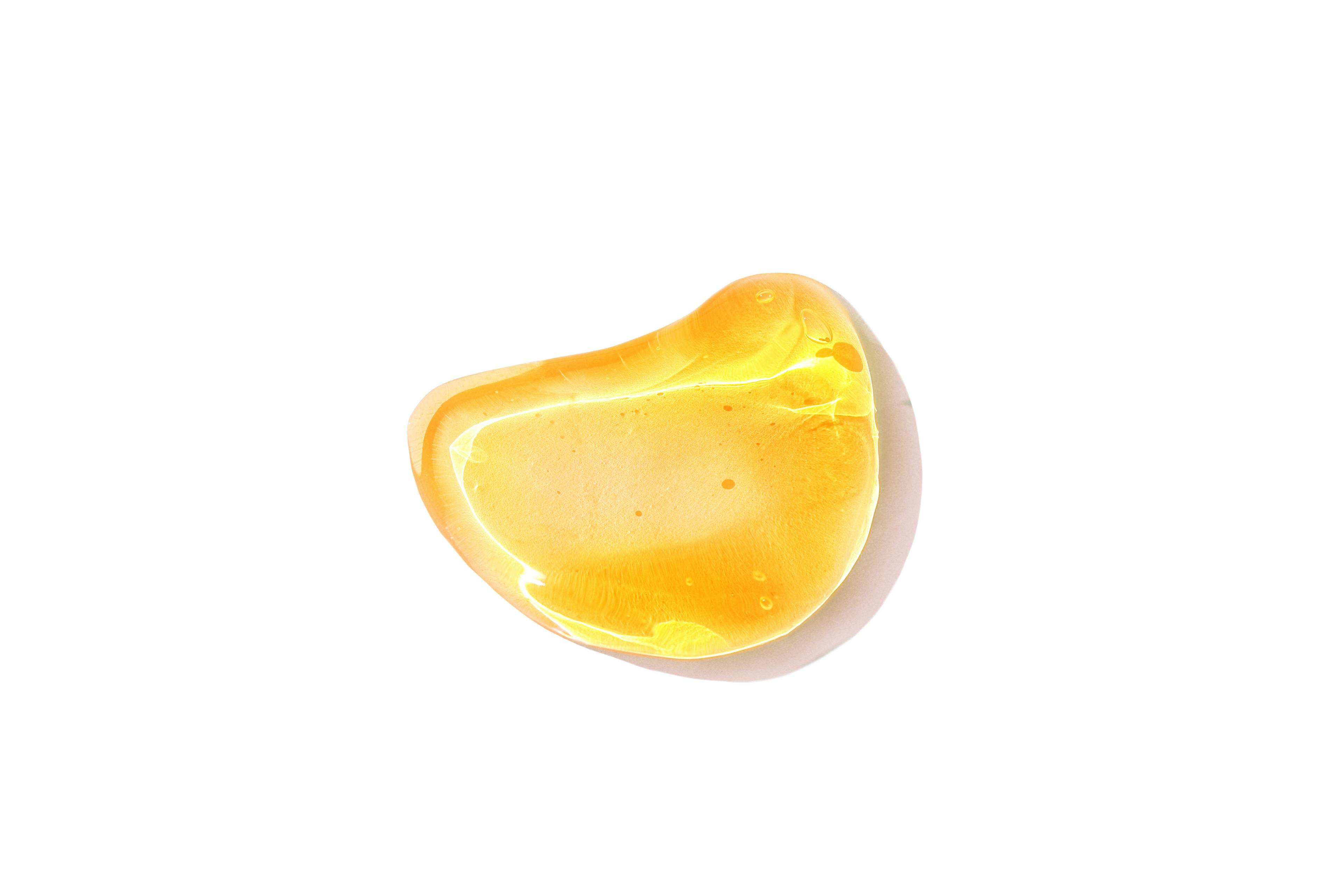 Yellow gel on a white background